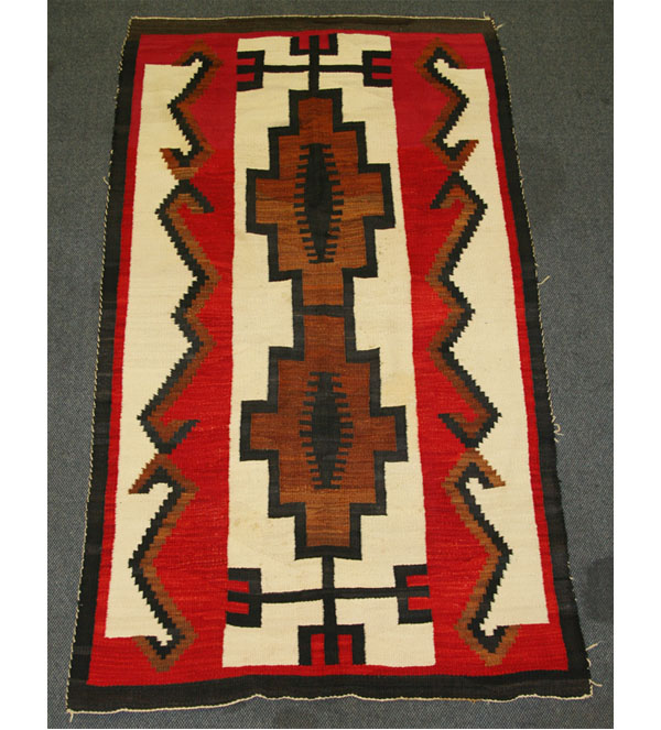 Appraisal: Large hand loomed wool Navajo blanket rug with vibrant repeating