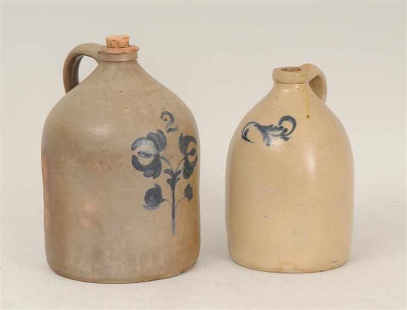 Appraisal: STONEWARE JUG With underglaze '' '' above floral stem together