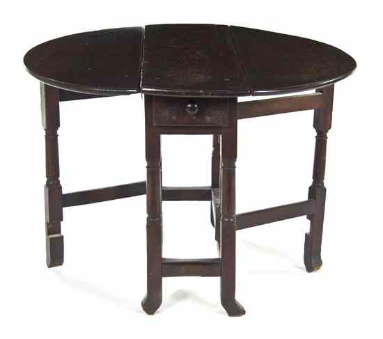 Appraisal: An American Oak Drop-Leaf Gate-Leg Table having a rectangular top