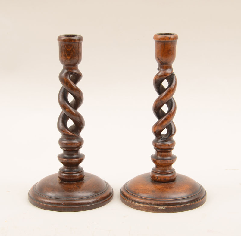 Appraisal: Pair of English Oak Candlesticks With openwork spiral twist stems