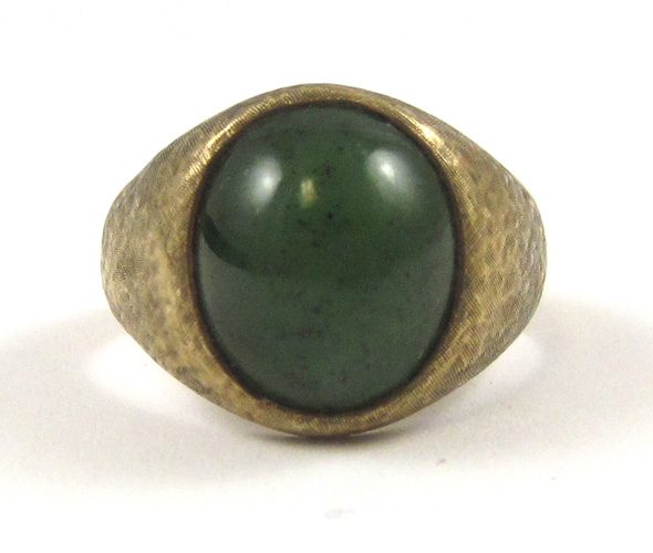 Appraisal: GREEN CABOCHON AND TEN KARAT GOLD RING with an oval