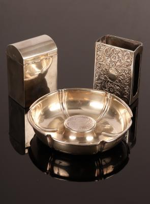 Appraisal: A hexagonal silver ashtray London the central boss set a