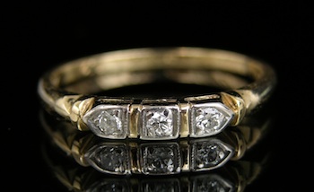 Appraisal: A Charming Three Diamond Band k yellow gold band set