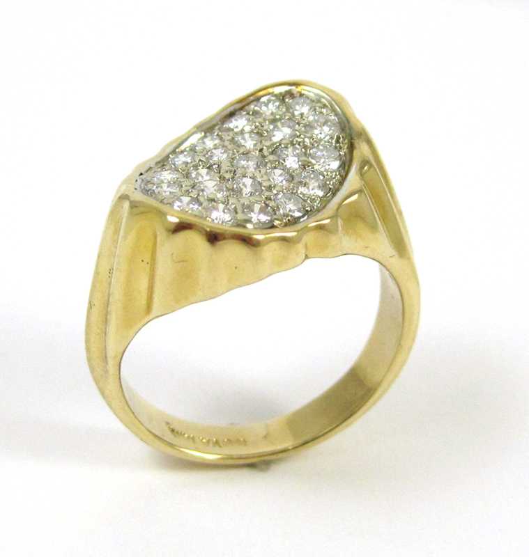 Appraisal: DIAMOND AND FOURTEEN KARAT GOLD RING with Reliant Gem Lab