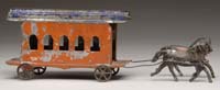 Appraisal: EARLY AMERICAN TIN TROLLEY Red trolley with blue roof being