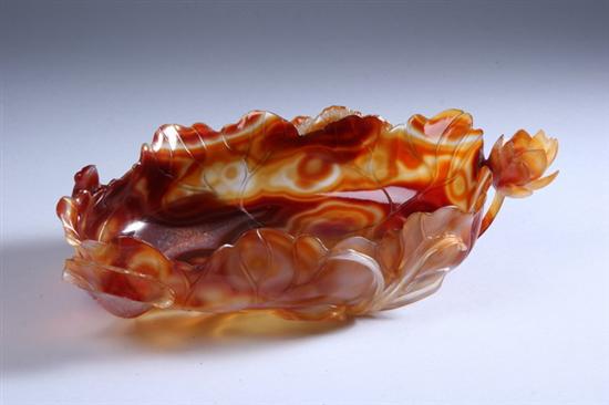 Appraisal: CHINESE CARVED STRIATED AGATE FREE-FORM SHAPED DISH Vigorously striated in