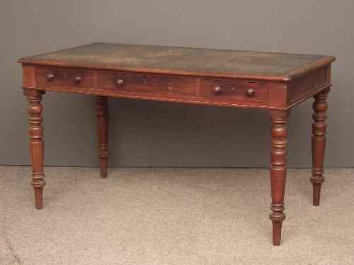 Appraisal: A Victorian mahogany rectangular writing table the top inset with