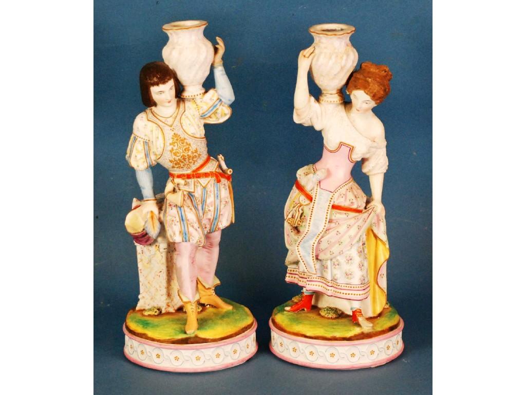 Appraisal: PAIR OF LATE NINETEENTH CENTURY CONTINENTAL TINTED BISQUE FIGURES modelled