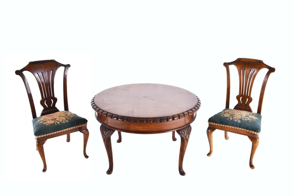 Appraisal: MINIATURE CARVED MAHOGANY TABLE PAIR OF CHAIRSIn a George III