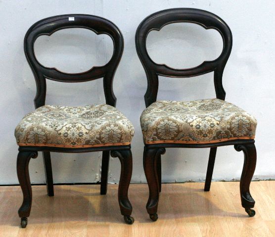 Appraisal: A pair of Victorian mahogany balloon back chairs