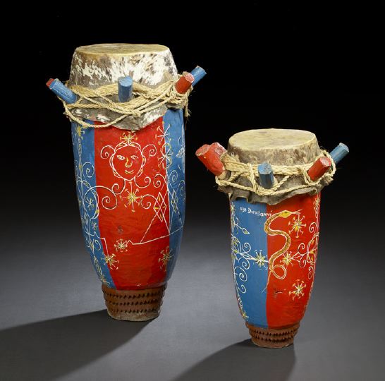 Appraisal: Two Haitian Polychromed Hardwood Rope and Cowhide Rada Drums used