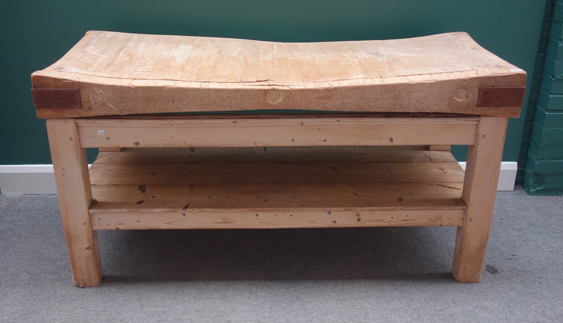 Appraisal: A large rectangular iron bound butcher's block the beech top