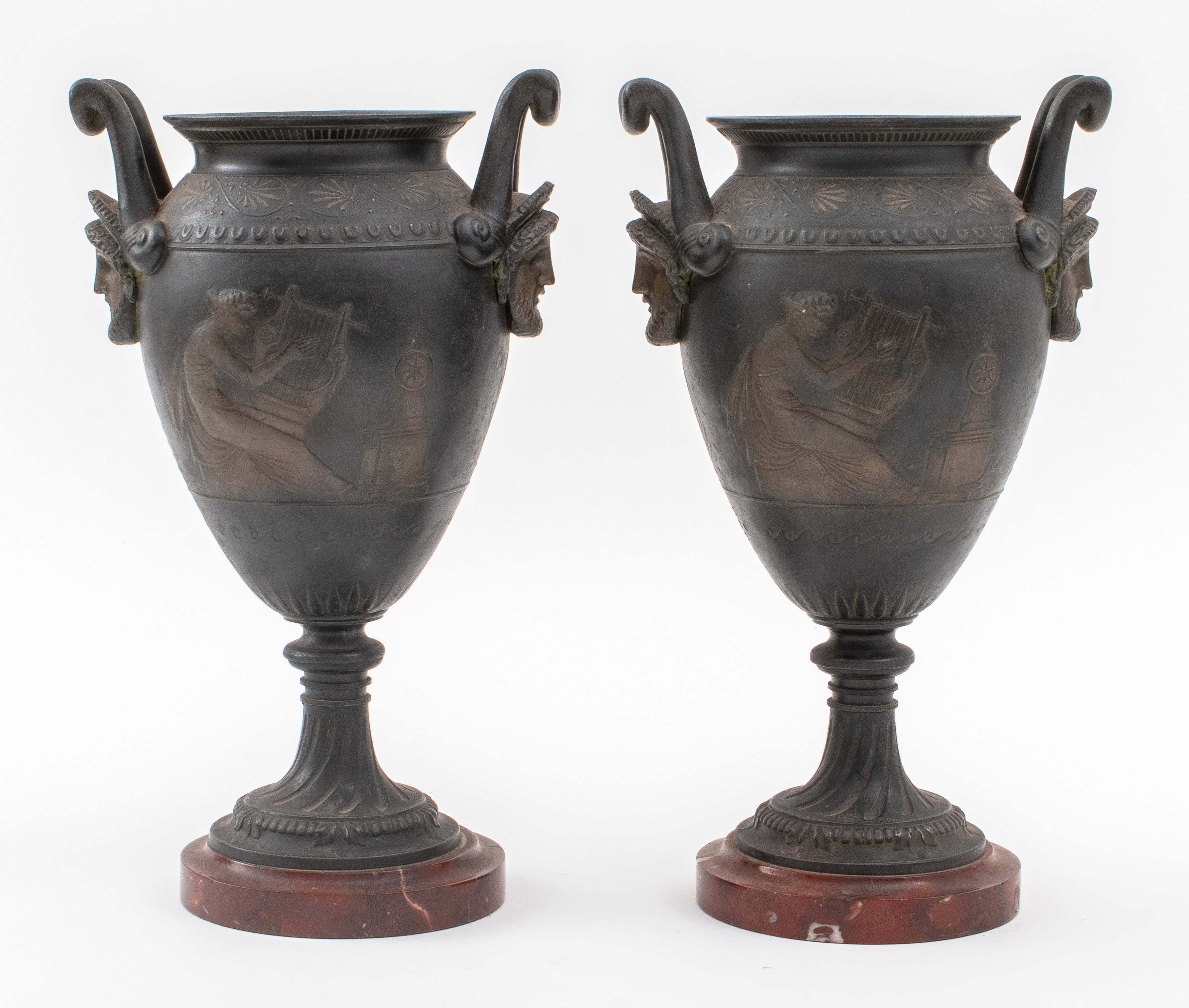 Appraisal: GRAND TOUR NEOCLASSICAL STYLE CAST IRON URNS PAIR Pair of