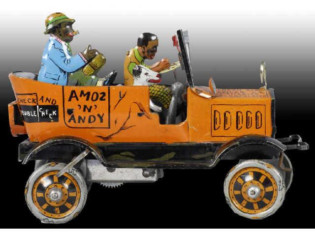 Appraisal: Tin Marx Amos N Andy Taxi Toy Description Working All