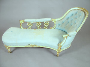 Appraisal: A Victorian painted and parcel gilt chaise longue the carved