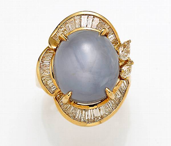 Appraisal: A star sapphire diamond and eighteen karat gold ring estimated