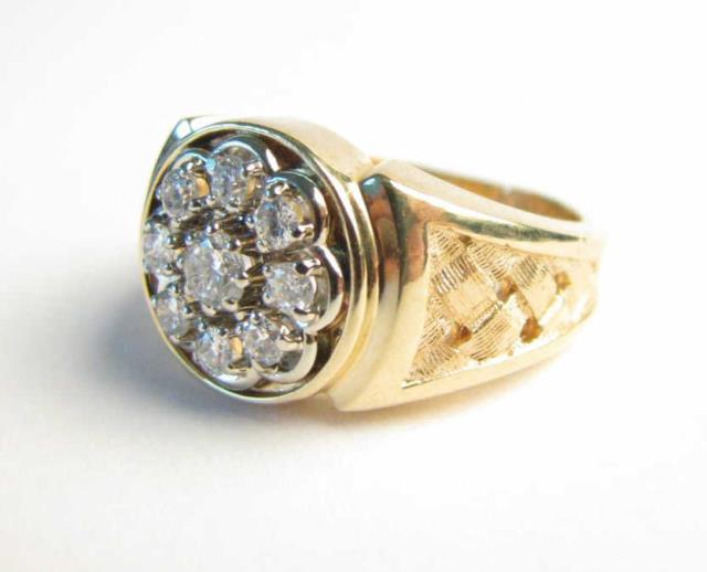 Appraisal: A K yellow gold gentleman's cluster ring with nine round