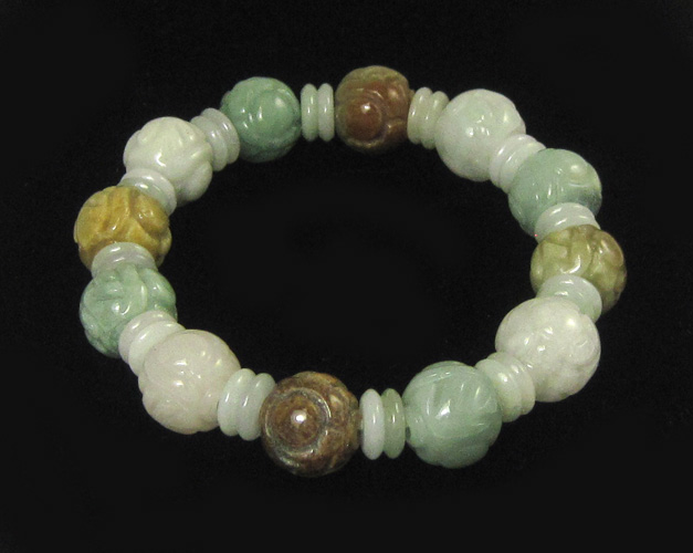 Appraisal: MULTI-COLOR JADE BEAD BRACELET having twelve round carved jade beads