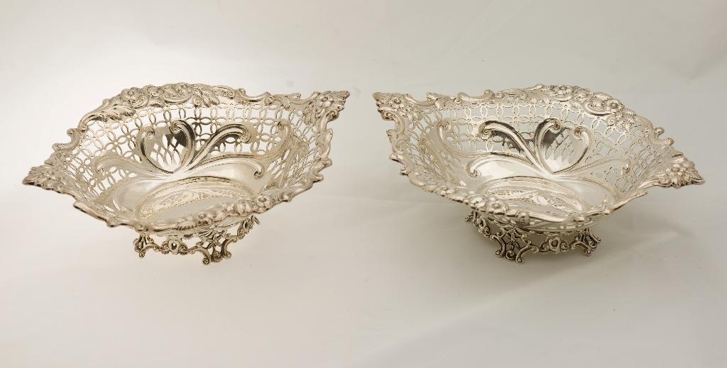 Appraisal: PAIR OF VICTORIAN PIERCED SILVER BREAD OR PASTRY BASKETS LONDON