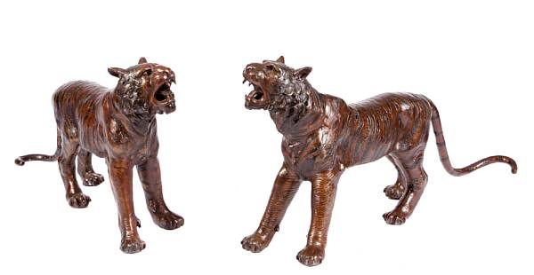 Appraisal: A pair of patinated bronze models of tigers height in