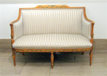 Appraisal: Sheraton style painted satinwood settee modern The straight back with