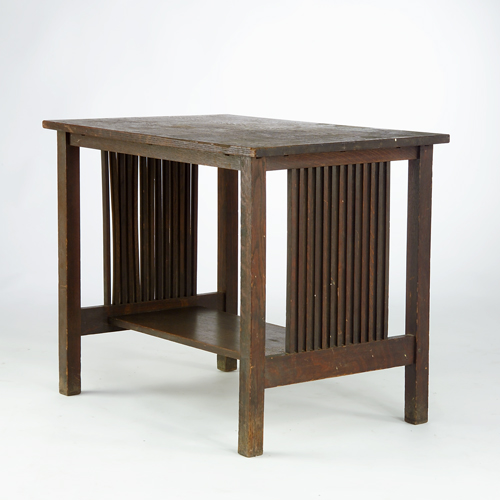 Appraisal: GUSTAV STICKLEY Library table with spindled sides and lower shelf