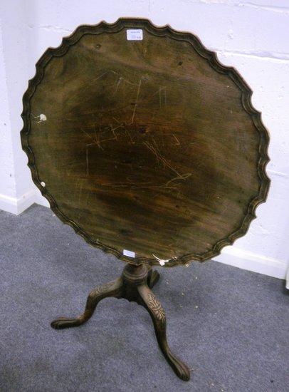 Appraisal: A George II style tripod table the shaped top with