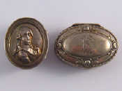 Appraisal: An oval silver pillbox the hinged lid with embossed bust