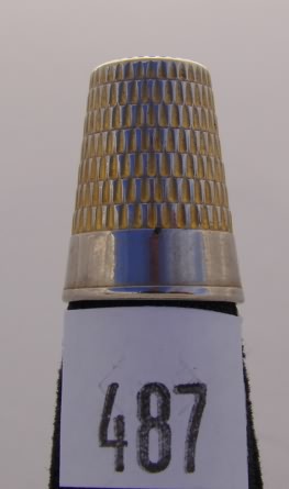 Appraisal: Gold tone thimble with rectangular indentations