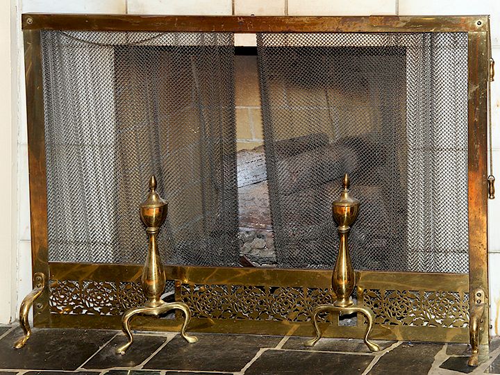 Appraisal: Brass Fireplace Set A mid th century screen and andirons