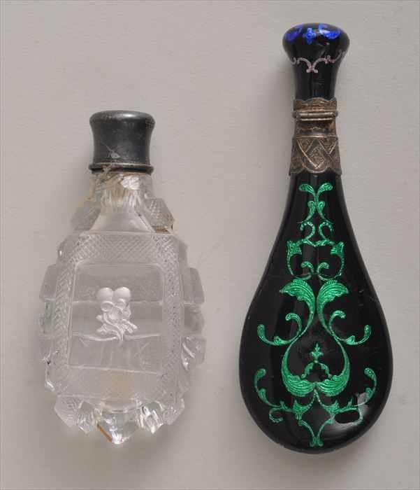 Appraisal: AUSTRIAN ENAMEL SCENT BOTTLE AND A CUT-GLASS BOTTLE The one