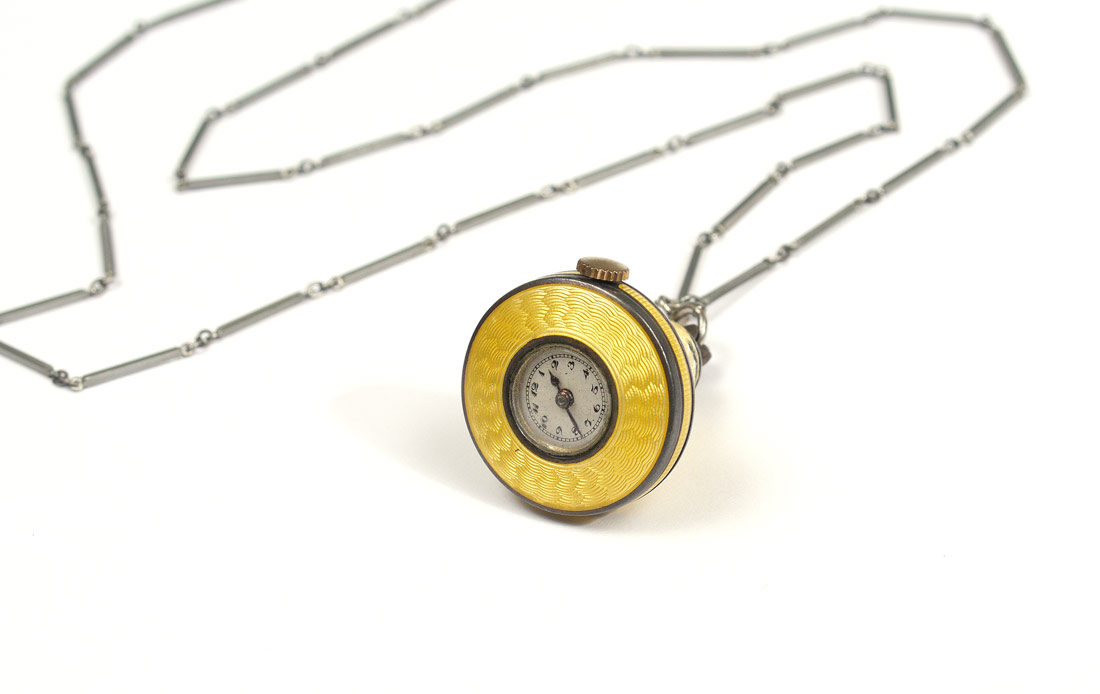 Appraisal: YELLOW GUILLOCHE ENAMEL PENDANT WATCH Unmarked yellow guilloche case paper