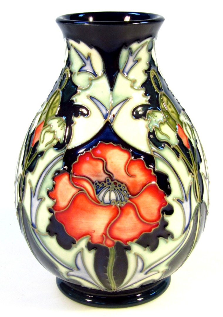 Appraisal: A Moorcroft pottery vase probably Povot pattern of globular circular