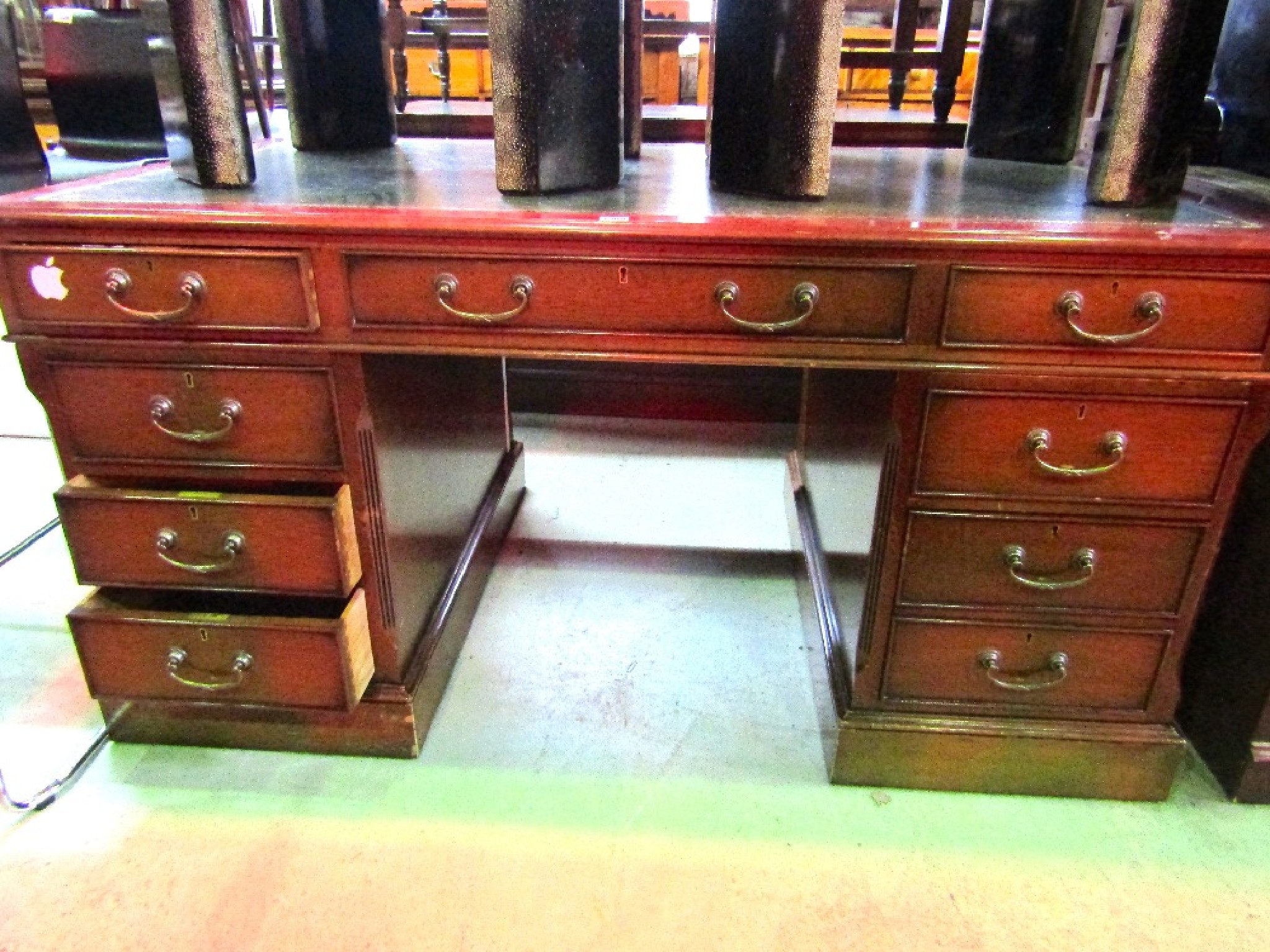 Appraisal: A good quality reproduction mahogany kneehole twin pedestal partners desk