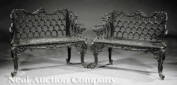 Appraisal: A Pair of American Rococo Cast Iron Settees mid- th