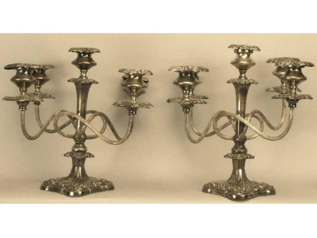 Appraisal: Pair of Vanbergh quadruple plated four arm candelabras Measures tall