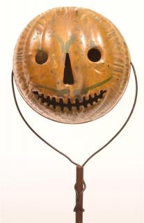 Appraisal: Early th Century Tin Jack-O-Lantern Trick-or-Treat or Parade Torch Mounted