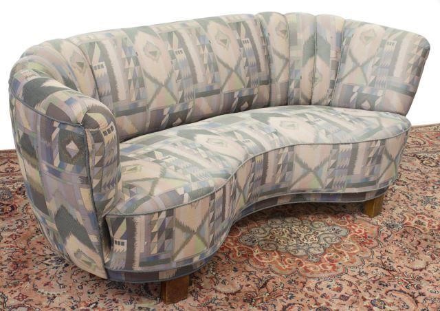 Appraisal: Art Deco upholstered sofa curved back with vertical channel tufting