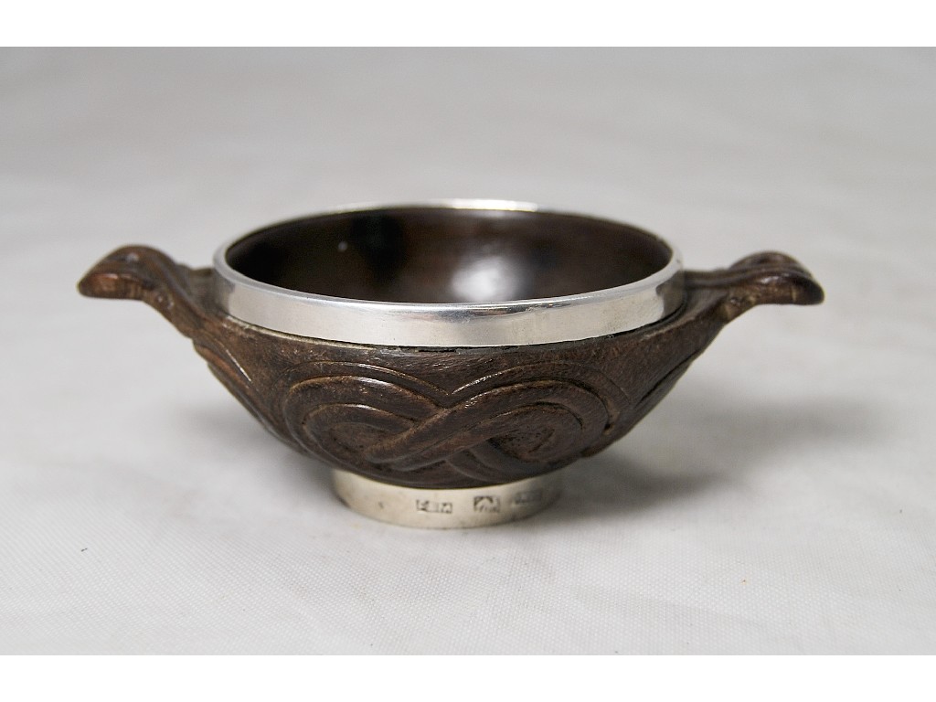 Appraisal: A Scottish Provincial Arts Craft quaich with silver rim foot