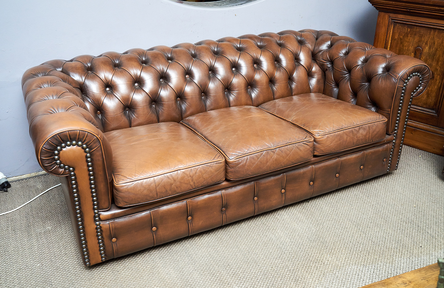 Appraisal: AN EXCEPTIONAL PAIR OF 'MORAN' BROWN LEATHER CHESTERFEILD SOFAS Distressed