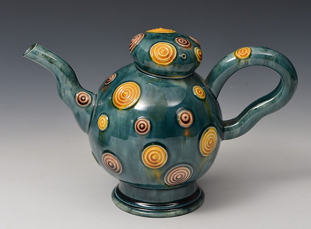 Appraisal: Walter Keeler British b Teapot and cover running turquoise glazeapplied