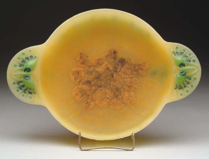 Appraisal: A WALTER PATE DE VERRE HANDELED BOWL Citrus orange interior