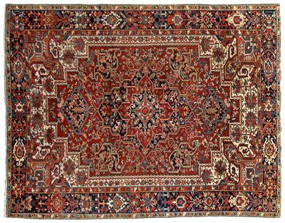 Appraisal: Heriz rug central medallion on brick red field borders with