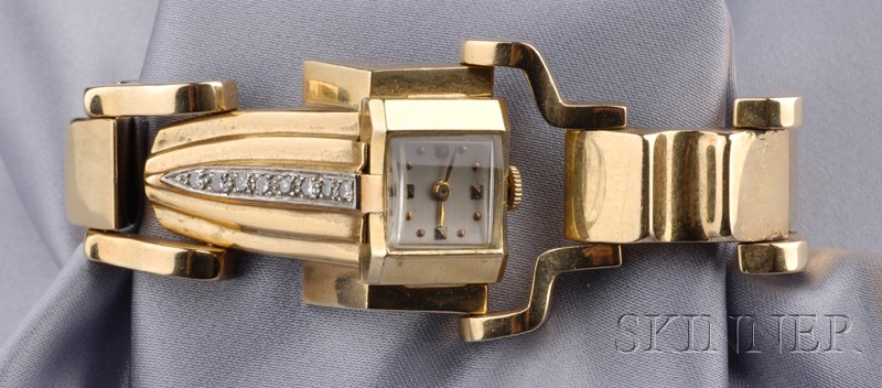 Appraisal: Retro kt Gold and Diamond Wristwatch the silvertone dial with