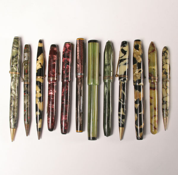 Appraisal: Fountain pen and pencil sets marbleized cases various manufacturers Longest