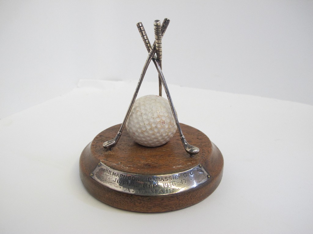 Appraisal: A silver mounted golf trophy - three clubs crossed over