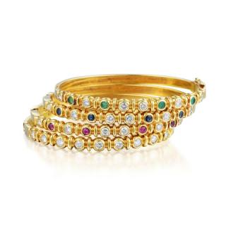 Appraisal: A Set of Four Diamond and Gemstone Bangle Bracelets Crafted