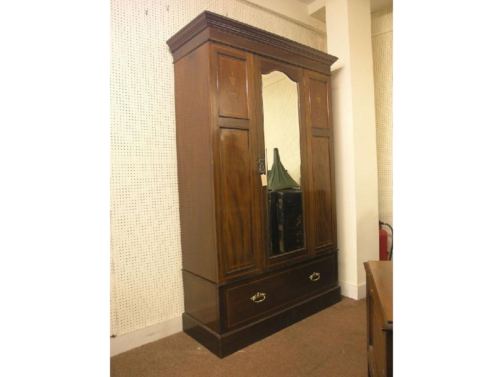 Appraisal: A matched Edwardian inlaid mahogany bedroom suite consisting of wardrobe