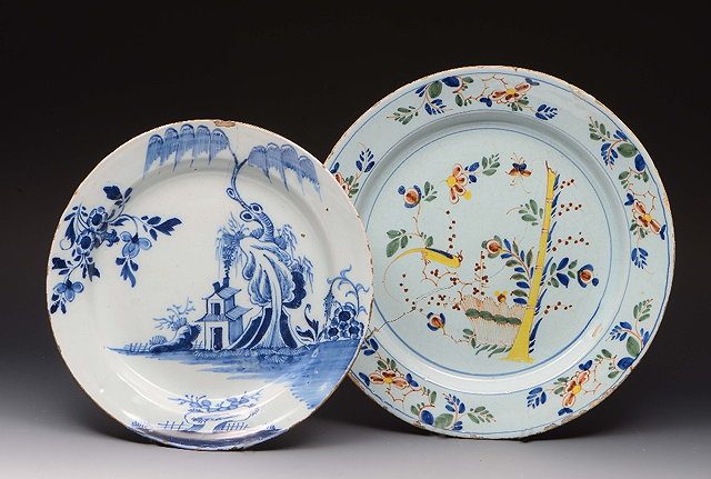 Appraisal: A LAMBETH DELFT BLUE AND WHITE DISH decorated a summer