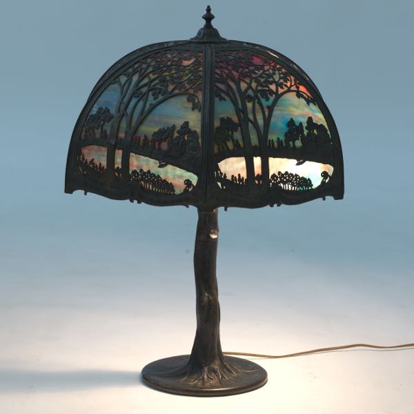 Appraisal: SCENIC LAMP WITH TREE TRUNK MOTIF BASE wide x tall